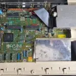 A picture taken of a Commodore Amiga 500 rev 6 motherboard.