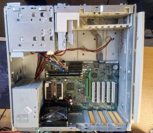 Inside shot of a Dell Dimension 4100 showing the processor board and drive cages